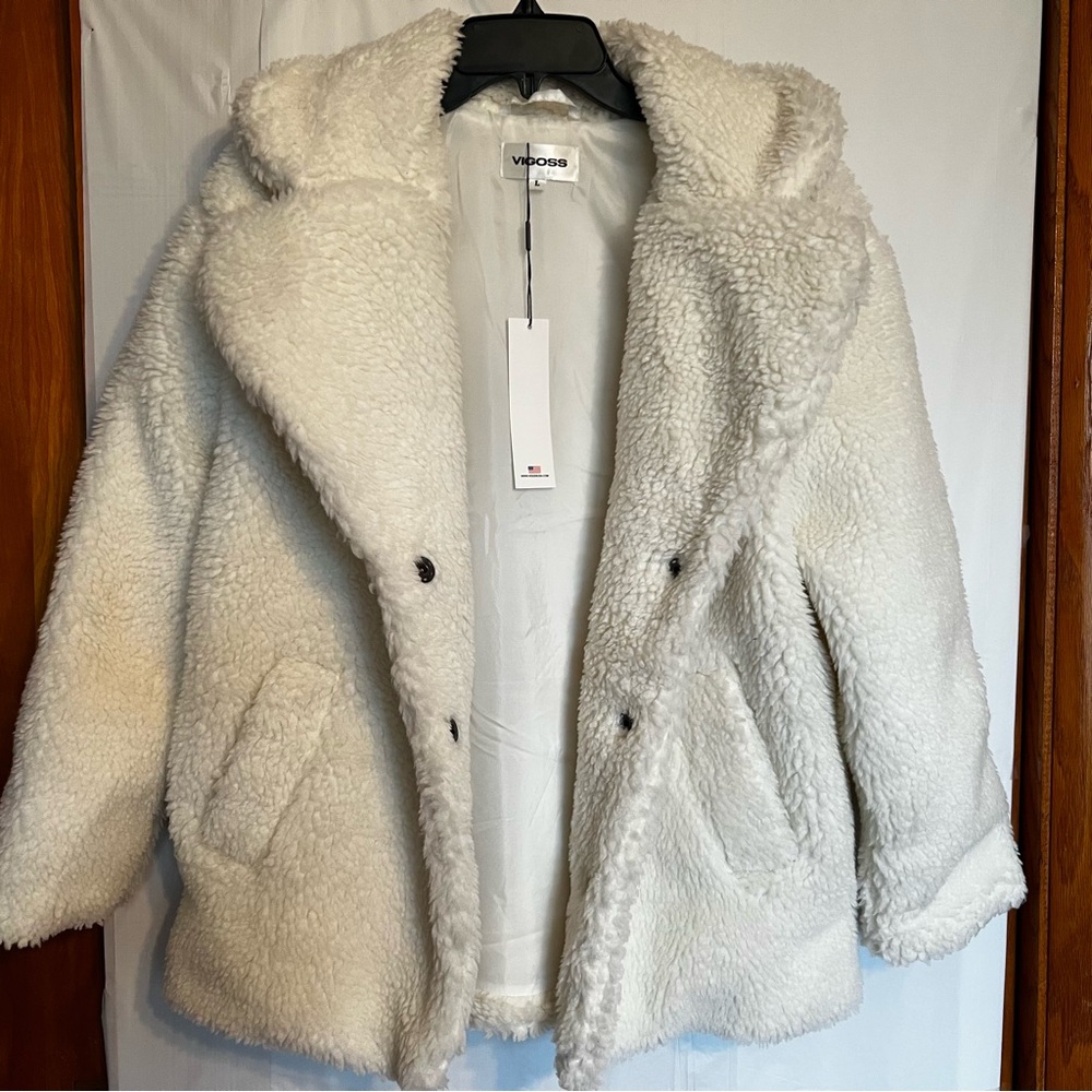 New with Tags Vigoss front buttoned Ivory Jacket. Women’s size L.